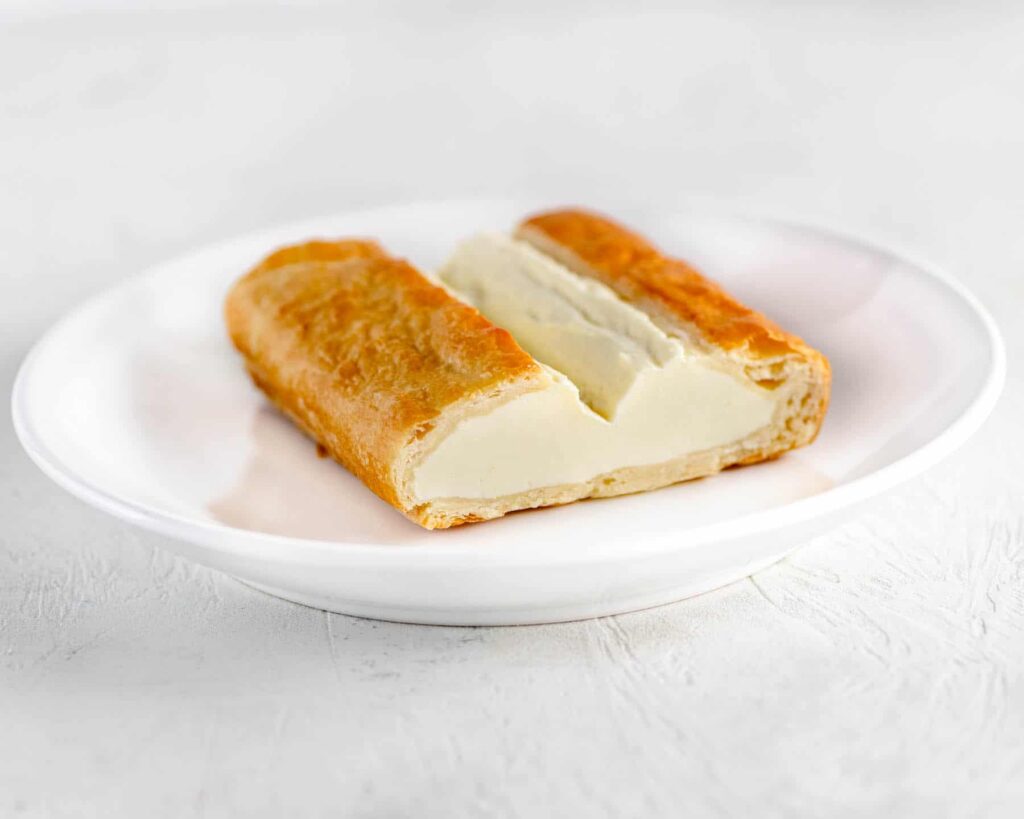 cheese danish on a white plate