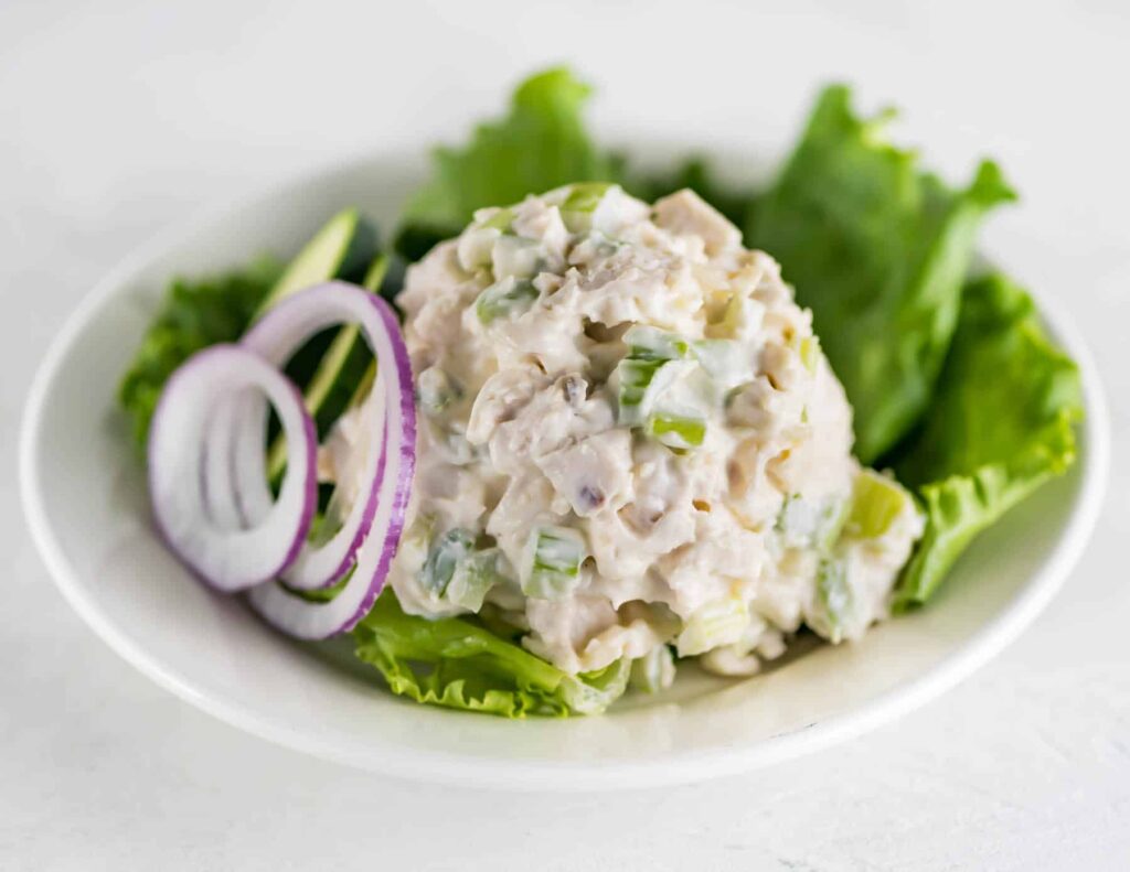 Chicken Salad appetizer on a white plate