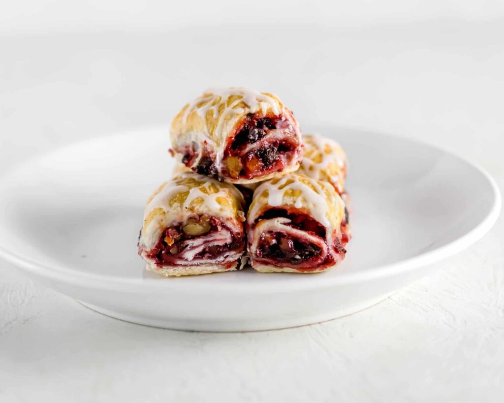 White plate of raspberry rugelach