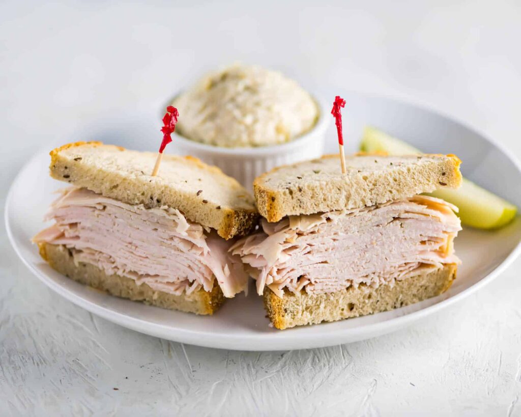 Fresh Roast Turkey  Sandwich on White Plate
