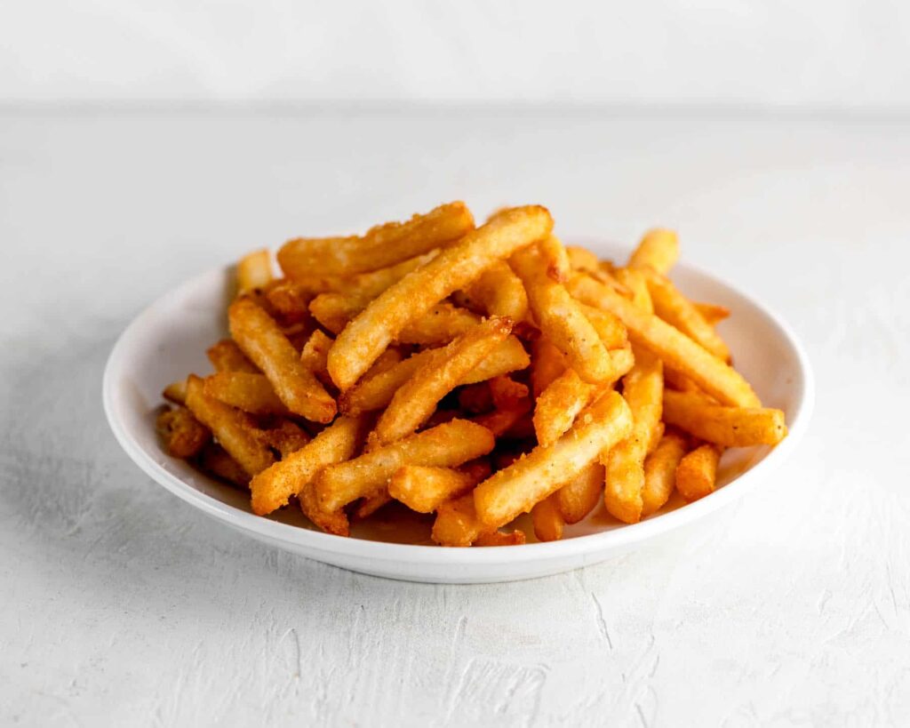plate of crispy lightly battered fries