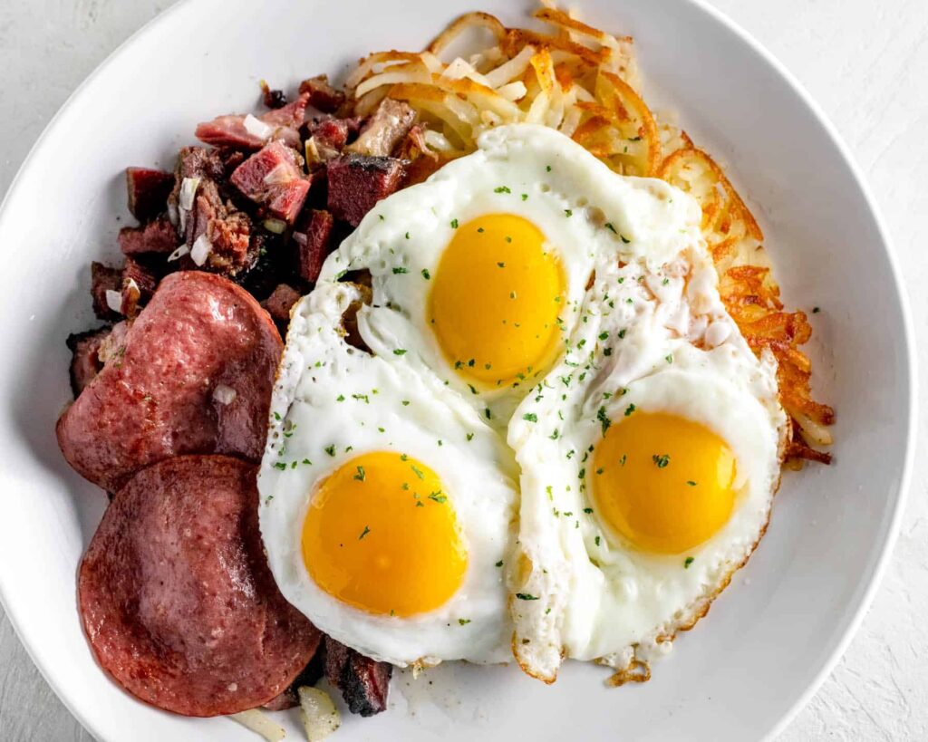sunny side up eggs with deli meat and hash browns