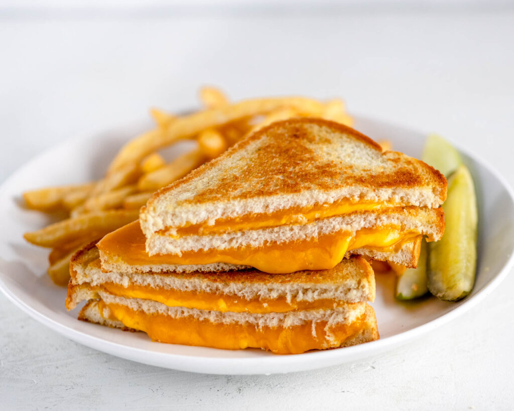 Grilled Cheese sandwich on white plate